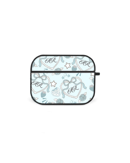 a light blue and white patterned case with a black border, featuring a repeating design of flowers, stars, and the initials "AR" on it.