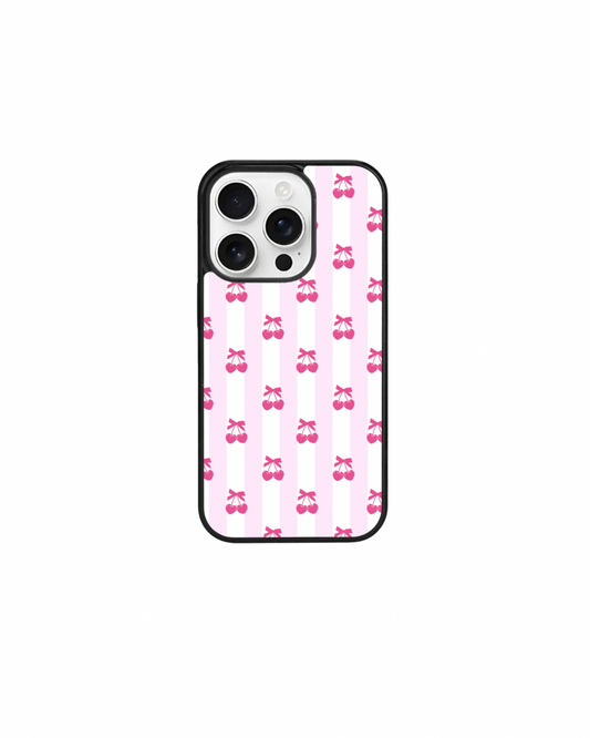 a phone case with a pink and white striped pattern, including small pink ballet slippers.